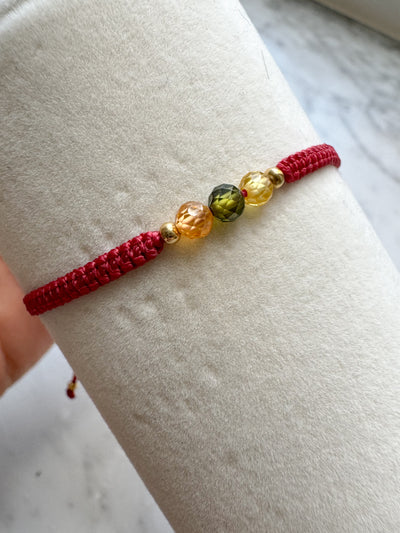 Hand woven in waxed thread with gemstone