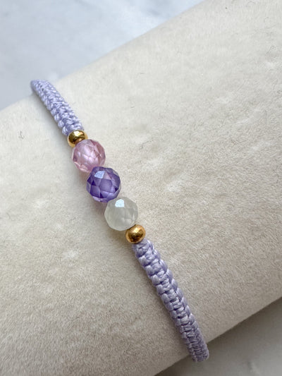 Hand woven in waxed thread with gemstone